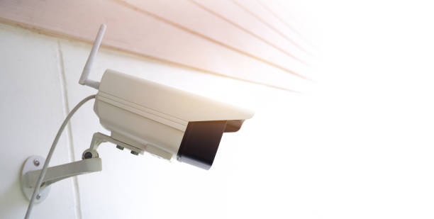 istock CCTV IP Camera wireless on house wall with copy space 1412143797