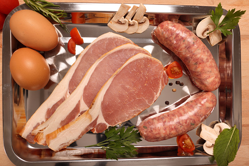 Lean cuts of Smoked Back Bacon with eggs and sausages