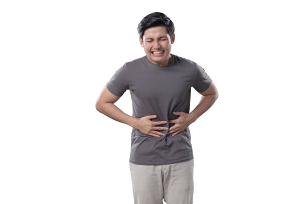 istock Indonesian Man on white Background get a stomachace 1412145173