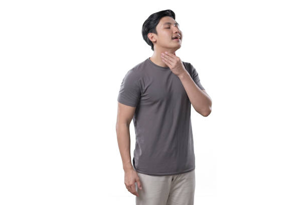 istock Indonesian Man on white Background relieve from sore throat 1412145217