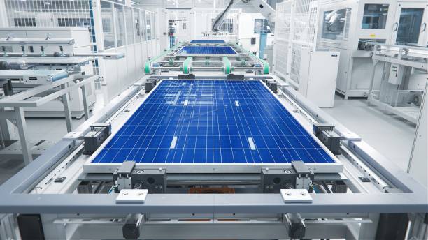 istock Solar Panel Production Process at Modern Bright Automated Factory. Shot of a Solar Panel on Assembly Line During Manufacturing Process. 1412146362