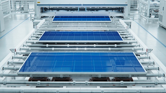 Solar Panel on Conveyor Line during Production Process at Modern Bright Automated Factory.