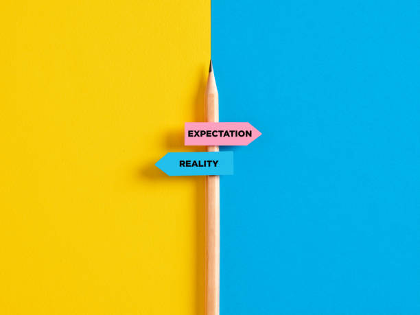 istock Reality vs expectation contrast or choice. 1412146724