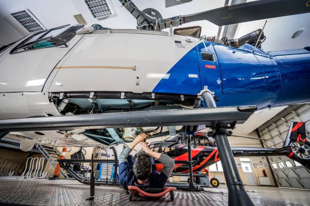 istock Mechanic repairing helicopter engine 1412148878