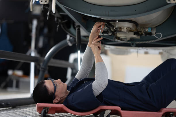 istock Mechanic repairing helicopter engine 1412148900