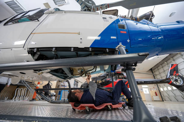 istock Mechanic repairing helicopter engine 1412148907
