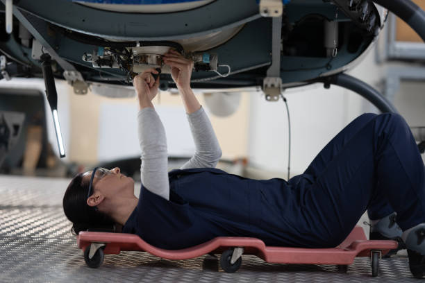 istock Mechanic repairing helicopter engine 1412148927