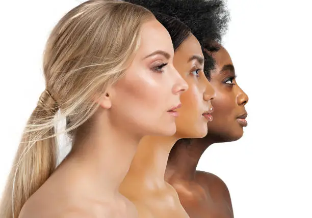 Photo of Beauty Diversity Faces. Multi Ethnic Women Caucasian, African and Asian. Three Woman Profile with different Skin Type and Color over White Isolated. Facial Care Cosmetics and Make up