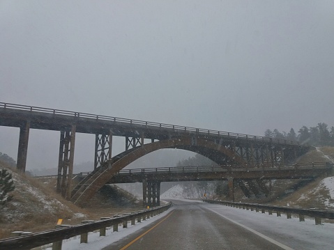 This set of bridges, called the Keystone Wye, it located outside of Keystone, in the Black Hills of South Dakota. It is an interchange of U.S. Route 16 and US 16A. It features two unique glued laminated timber bridges. It opened in 1966.