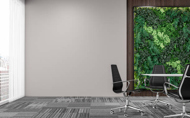 istock Empty office interior with a conference table and chairs in front of the vertical garden, partly hardwood background, partly light gray plaster wall, and large windows 1412154345