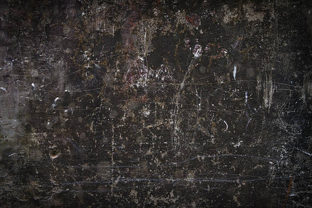 Dark background of a dirty scratched wall. Dark background of a dirty scratched wall. scuff marks photos stock pictures, royalty-free photos & images