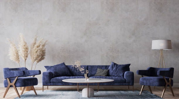 istock Rustic room design with dark blue sofa and dried flowers on gray interior background 1412154740