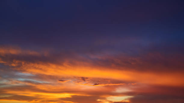 istock Real amazing sunrise or sunset sky with gentle colorful clouds 1412157155