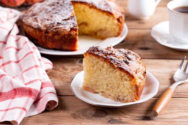 istock Clasic sponge cake, selective focus. Homemade pie on rustic wooden table 1412157611