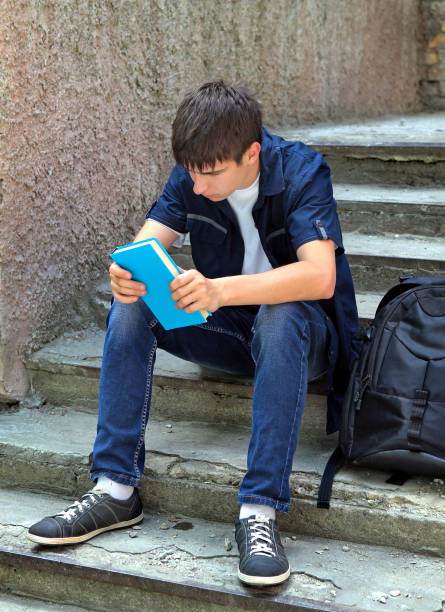 istock Sad Young Man outdoor 1412157913