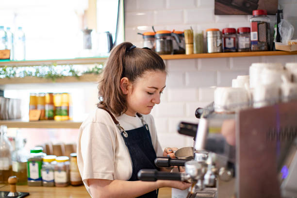 istock Barista making coffee with coffee machine at the cafe 1412163397