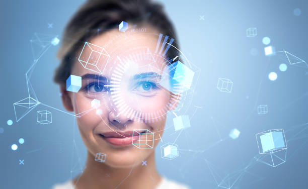 istock Smiling woman and data blocks in cyberspace, metaverse and virtual reality 1412174012