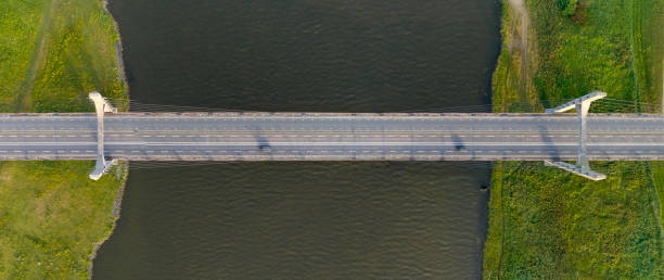 istock Suspension bridge over the river IJssel 1412174373