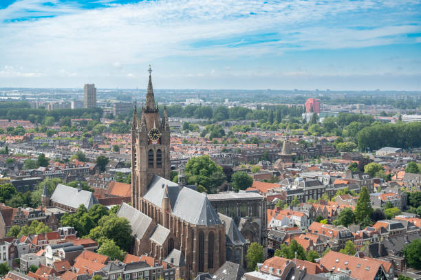 Oude Kerk (Old Church) in Delft seen from above during a summer day in the city in South Holland, The Netherlands.The Old church is also cold Old Jan or Scheve Jan because of the leaning tower.