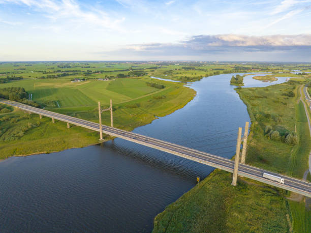 istock Suspension bridge over the river IJssel 1412174529