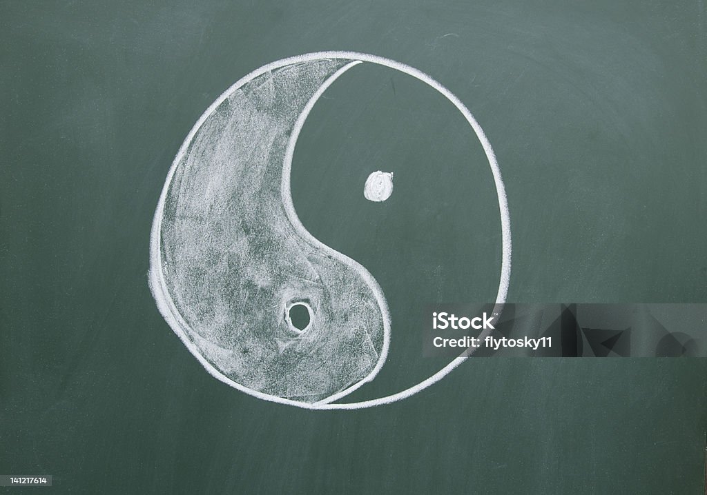 Tai Chi symbol drawn with chalk on the blackboard Abstract Stock Photo