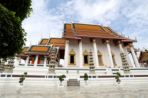 Bangkok, Thailand - July 9, 2022: Wat Suthat Thepwararam Ratchaworahawihan, the famous Buddhist temple in Bangkok Thailand.