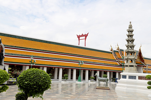 Bangkok, Thailand - July 9, 2022: Wat Suthat Thepwararam Ratchaworahawihan, the famous Buddhist temple in Bangkok Thailand.