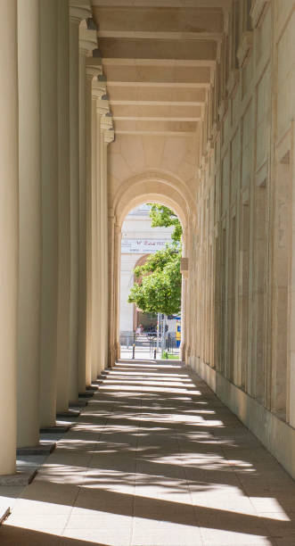 istock Colonnade ended with an arch 1412183064