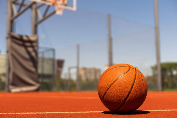 istock Basketball on Court Floor close up 1412188110