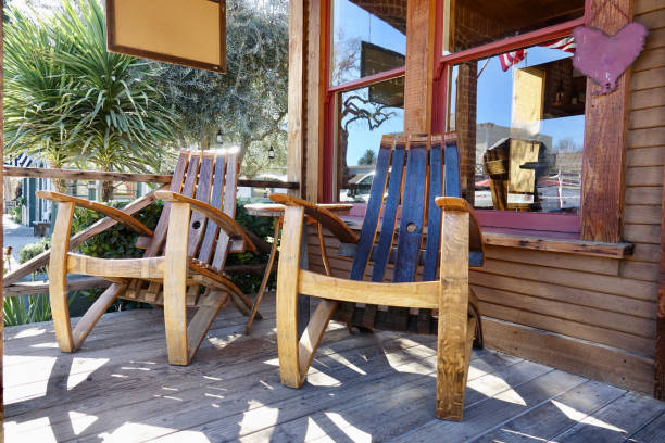 istock Modern Adirondack chairs made from wine barrels 1412191656