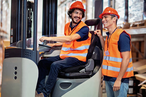 Men working in a warehouse stock photo
