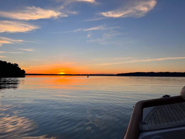istock Orange sunrise on the water summer 1412201692