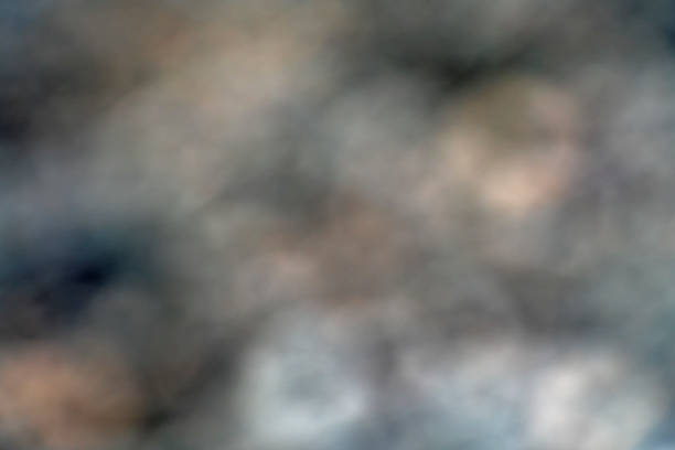 Blur focus bokeh from smoke on black background