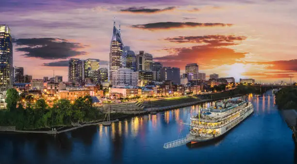 Photo of Nashville skyline with river and sunset