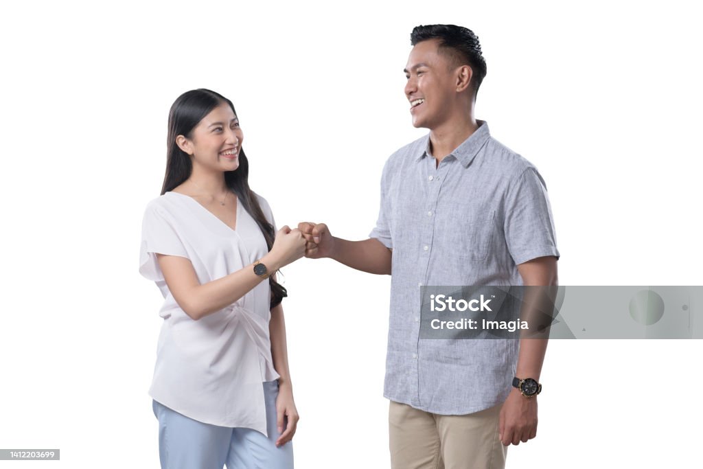 Southeast Asian Couple _fistbump Couple - Relationship Stock Photo