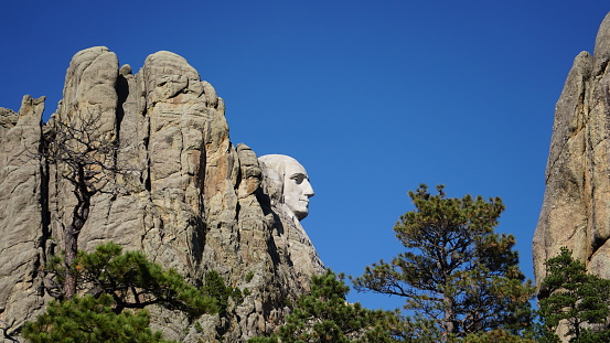 A profile view of George Washington as carved into Mt Rushmore national monument. South Dakota
