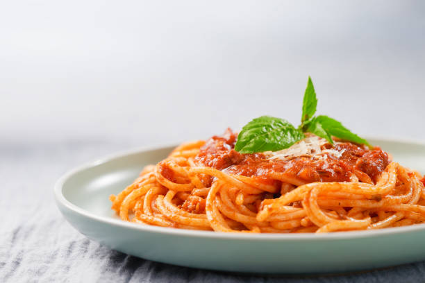 istock Spaghetti with bolognese sauce in a plate with copy space 1412204379