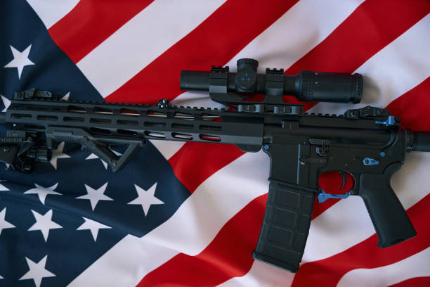 istock Gun with optical scope on background of American flag 1412206521