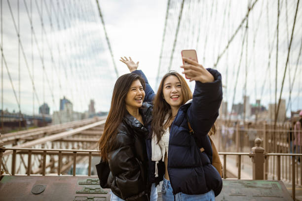 istock Tourist selfie time at Brooklyn Bridge 1412206909