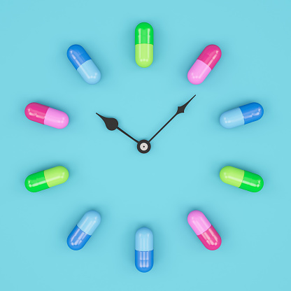 Time to Take a Pill Clock Face with Colorful Pills. 3D Render