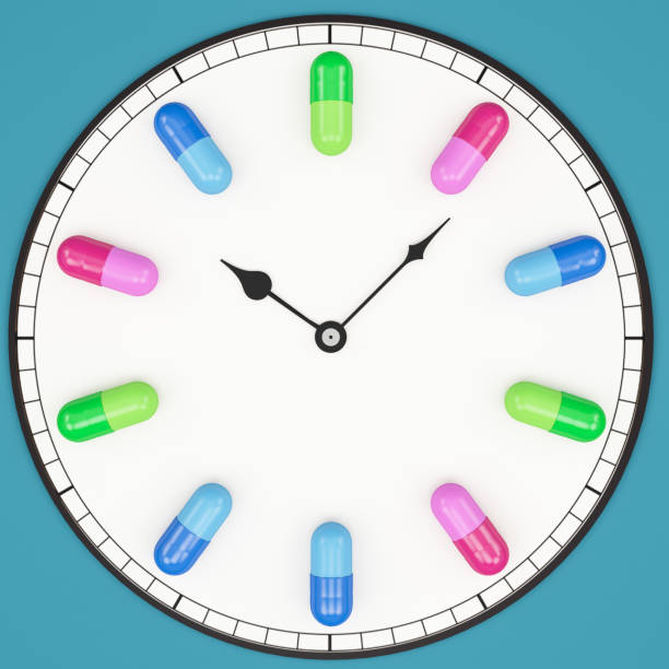istock Time to Take a Pill Clock Face with Colorful Capsules 1412208515