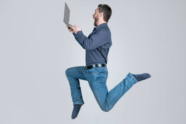 istock agile business. network administrator hold computer. energetic boss with wireless laptop. 1412208966