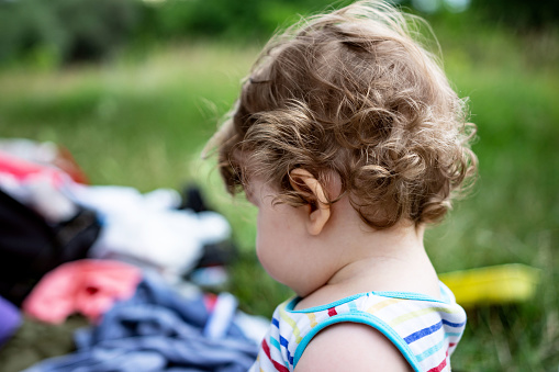 Baby girl enjoying on picnic