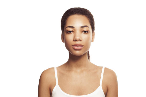 istock Young perfect black woman isolated on white studio wall background 1412214296