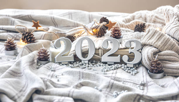 istock Christmas cozy background with numbers 2023 and decor details. 1412217131