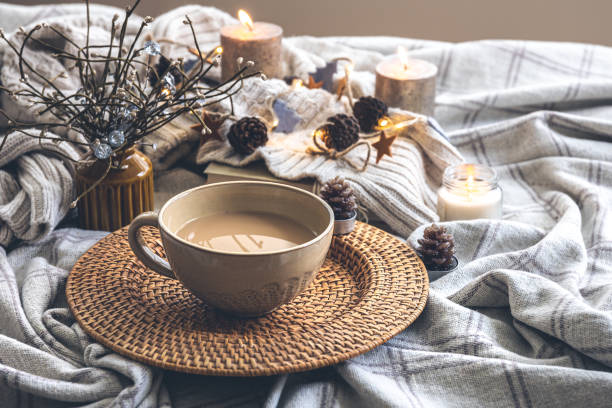 istock Cozy autumn composition with a big cup of coffee in bed. 1412217133