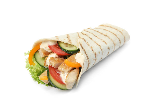 istock Tasty shawarma with chicken and vegetables isolated on white 1412223415