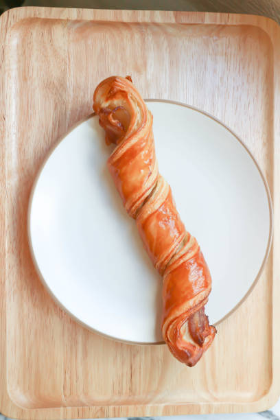 bacon twists , bacon cheese twists or Bacon and Cheese Straws bacon twists , bacon cheese twists or Bacon and Cheese Straws or Cheesy Bacon Wrapped Puff twisted bacon stock pictures, royalty-free photos & images