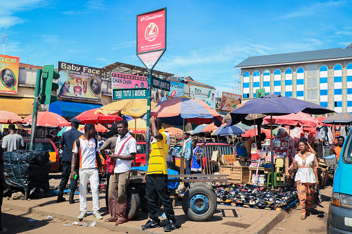 Kumasi, Ghana - April 04, 2022: Busy Street near the Ghana Central Market in Kumasi