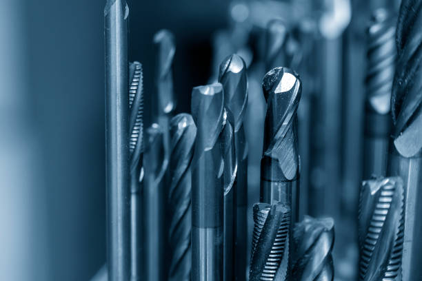 Close-up scene the group of used cutting tools for CNC milling machine. stock photo